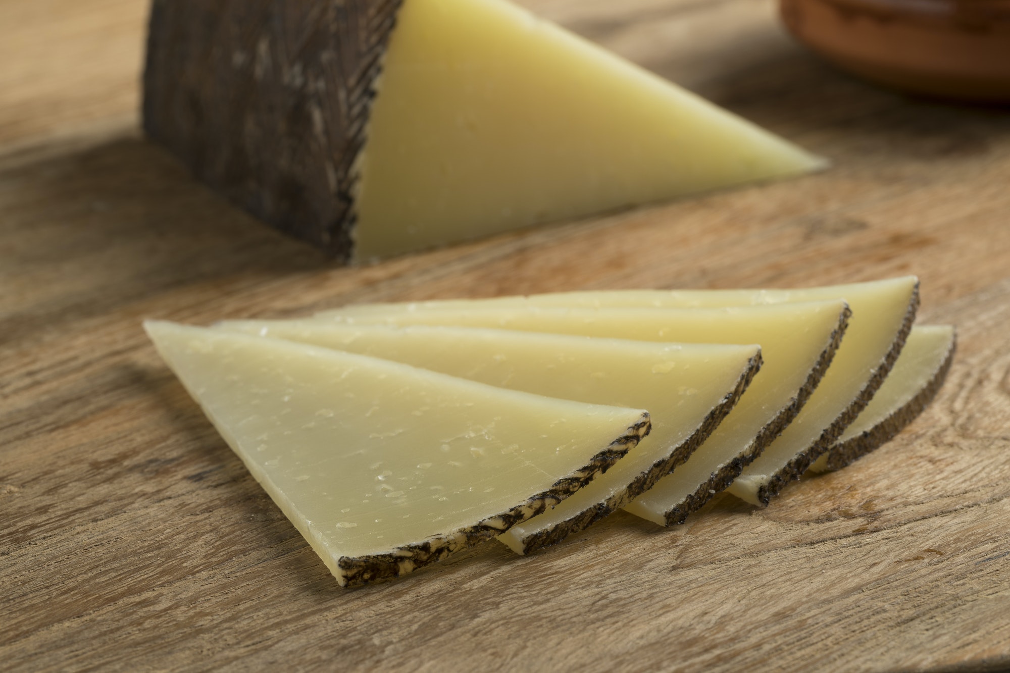 Slices of Spanish Manchego cheese